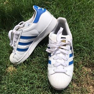 Adidas Superstars in blue